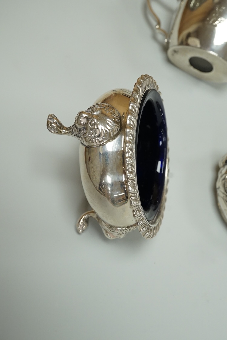 A Victorian silver drum mustard pot, a pair of later silver mustard pots and two silver salts including Victorian.